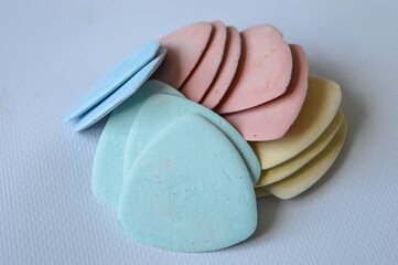 colorful tailor's chalks neatly arranged in a cardboard box, ideal for sewing, dressmaking, or...