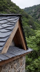Rustic architecture with slate roof and wooden eaves in natural landscape setting.