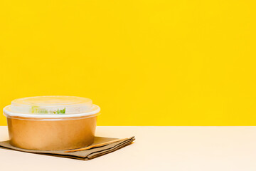 Healthy food lunch in kraft paper carton eco box disposable bowl packaging container.Take away delivery.environment protection.