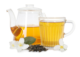 Aromatic jasmine tea in glass cup, teapot, flowers and dried leaves isolated on white