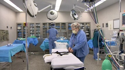 Medical staff preparing for operation in surgery 