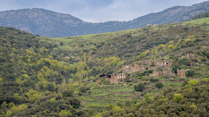 Abandoned stone village of Sendes nestled in Spanish Pyrenees mountains
