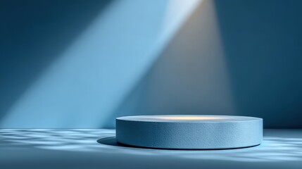 Round light blue podium platform stands centered in studio lighting against solid background with caustic light pattern on surface for product showcase