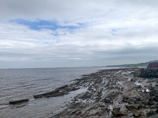 Watchet, UK, March 15, 2025. Watchet beach, coastal village, Somerset coast, England