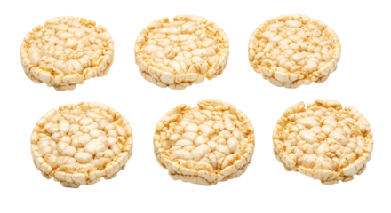 A close-up view of six round rice cakes arranged in two rows, showcasing their texture against a white background