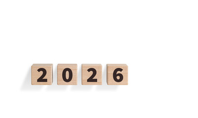 Wooden blocks with "2026" text on a white background are ideal for New Year decor. Their rustic charm adds a warm touch to festive or planning designs.