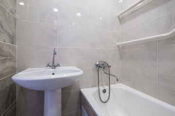 Water tap sink with faucet in expensive loft bathroom