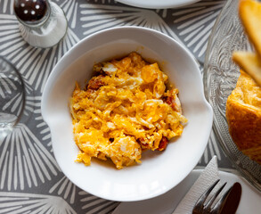 Huevos con chistorra - fried eggs with sausages served