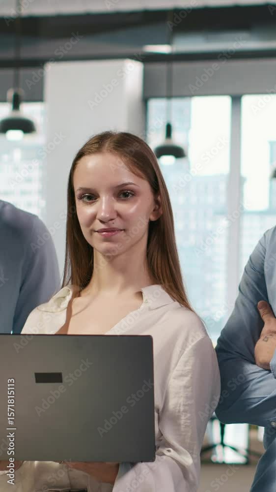 Poster vertical video portrait of happy teamworking engineers writing code, developing machine learning api
