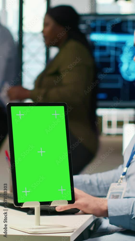 Poster vertical video startup technician using isolated screen tablet, developing artificial intelligence m
