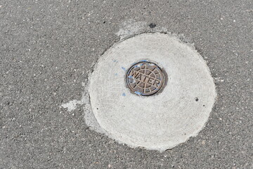 Small water access manhole.