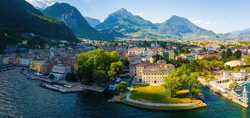 Aerial view of Riva del Garda on Lake Garda, Italy, featuring colorful buildings, marina, and...