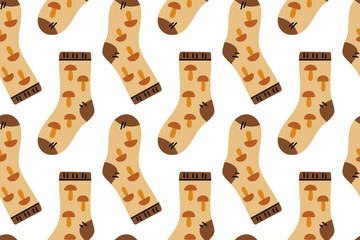 Seamless pattern with socks decorated with mushrooms. Autumn forest theme with warm tones and cozy texture.