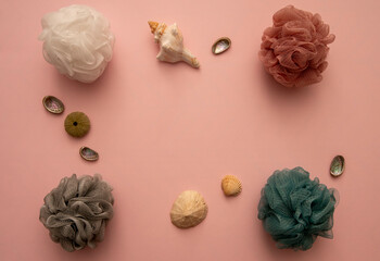colorful shower or bath sponges with seashells
