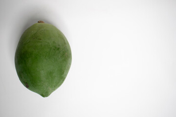 The appearance of green papaya fruit is smooth oval.