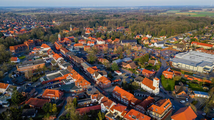 Aerial view around the old town of the city Zeven on a sunny autumn noon in Germany.	