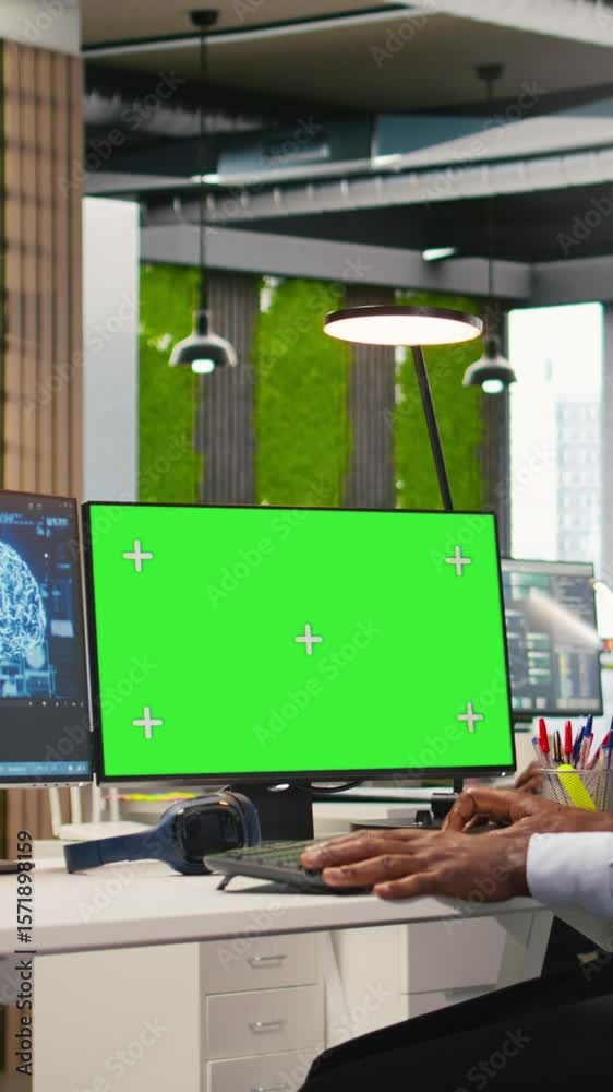 Poster vertical video engineer writing code on green screen pc, developing machine learning apis. it expert