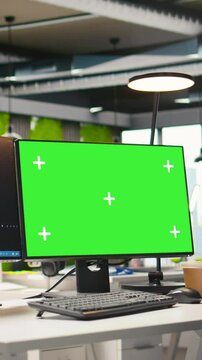 Vertical video Technology company workspace with chroma key computer used to conduct code reviews, fixing bugs. Isolated screen PC on office desk used to design and implement algorithms