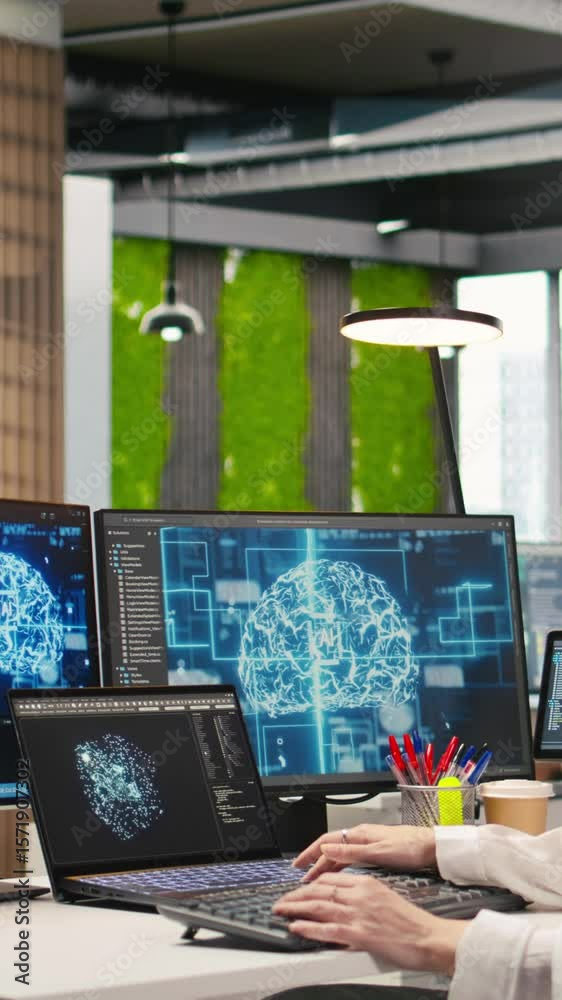 Poster vertical video junior developer in office integrating ai machine learning systems to streamline work