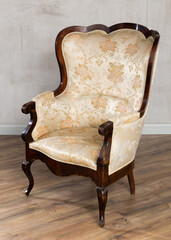 In cozy room, comfortable chair invites relaxation and contemplation in it