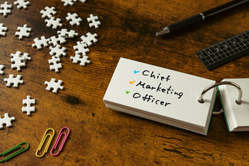 There is word card with the word Chief Marketing Officer. It is as an eye-catching image.