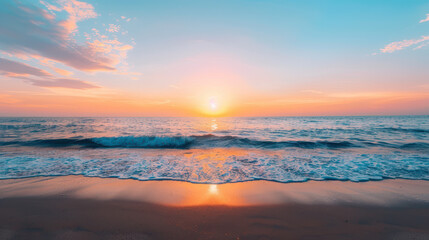 Fototapeta premium The ocean is calm and the sun is setting, creating a beautiful