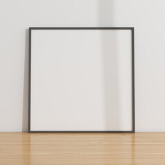 Square frame mockup on a wooden table and white wall. 3D rendering, interior design, 3D illustration