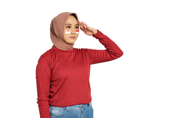 Beautiful Asian woman giving salute celebrate Indonesian independence day on 17 August isolated on...