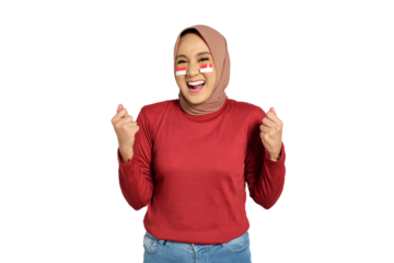 Excited young Asian women celebrate Indonesian independence day on 17 August by raising fists isolated on transparent background