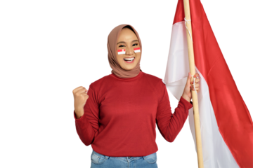 Excited young Asian women celebrate Indonesian independence day on 17 August by holding the Indonesian flag isolated on transparent background