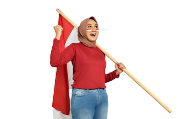 Excited young Asian women celebrate Indonesian independence day on 17 August by holding the Indonesian flag isolated on transparent background