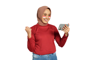 Excited young Asian women celebrate Indonesian independence day on 17 August while looking at cellphone screens isolated on transparent background