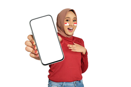 Surprised young Asian women celebrate Indonesian independence day on 17 August while holding smartphone with blank screen isolated on transparent background - Powered by Adobe