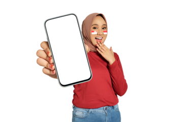 Surprised young Asian women celebrate Indonesian independence day on 17 August while holding smartphone with blank screen isolated on transparent background