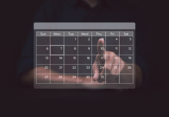 Business people use work schedules in business as a technological plan and project for proper...