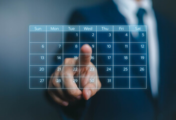 Business people use work schedules in business as a technological plan and project for proper...