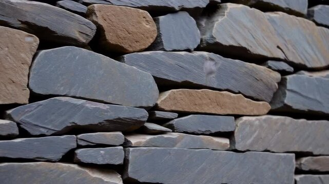 Stone wall showing different textures and colors