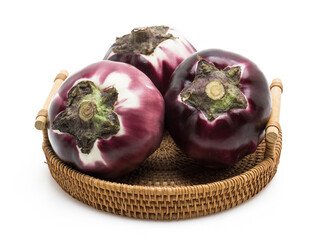 Fresh Round Purple Eggplants in a Wicker Basket Isolated on White Background