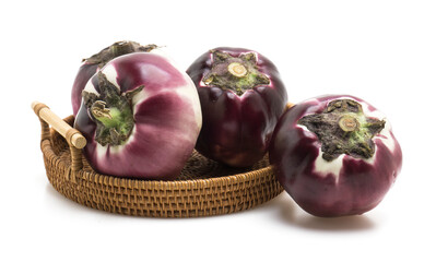 Fresh Round Purple Eggplants in a Wicker Basket Isolated on White Background