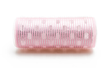 Pink Self-Adhesive Hair Roller for Voluminous Hairstyling and Bangs Isolated on White Background