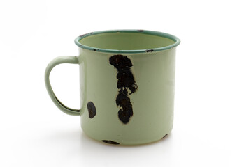 Vintage Green Enamel Mug with Distressed Details Isolated on White Background