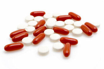 Assorted Pharmaceutical Pills and Capsules on White Isolated Background &ndash; Medicinal Tablets, Capsules and Dietary Supplements