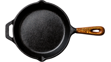 Cast Iron Skillet With Wooden Handle On Dark Background