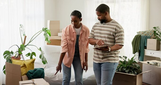 Black couple, boxes and new home with checklist for inventory, storage or relocation in apartment. Man, woman or checking cargo with clipboard or notes for moving, stock control or assurance in house