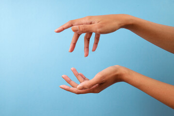Aesthetic Woman Hands Against Blue Background