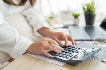Human use calculator and calculate bills and paying bill, credit card, tax and vat, payment,...
