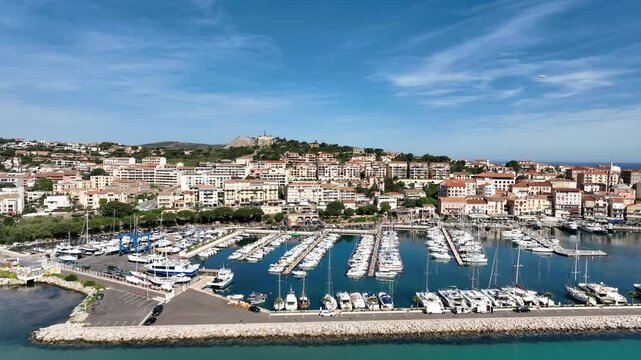 Marina and Yachts in Calvi Harbor With Town and Citadel in Background