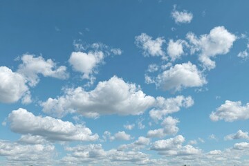 Clear blue sky with scattered clouds