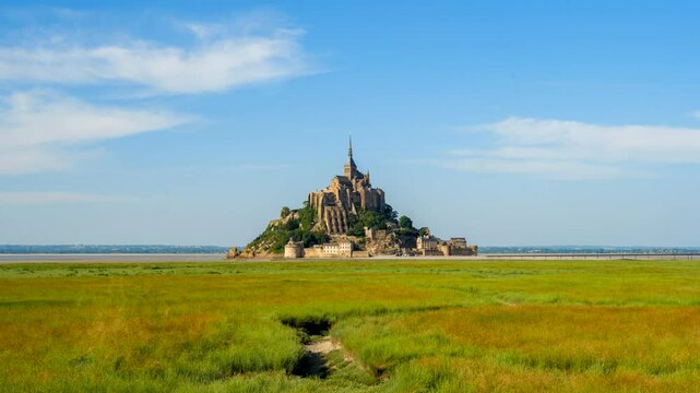 Timelapse of Mont Saint-Michel in Normandy, France on a Clear Sunny Day