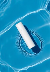 White cosmetic bottle floating on blue water white bottle